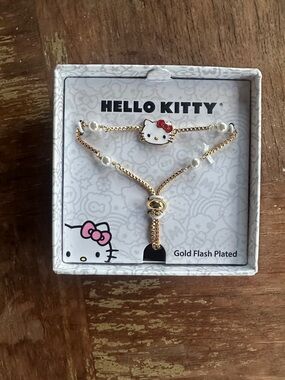 Hello Kitty Gold Flash Plated Bracelet with White & Red Accents